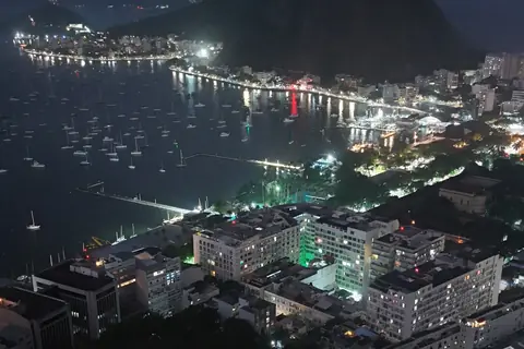 Botafogo Bay at night with Sugarloaf on the horizon, seen from above
